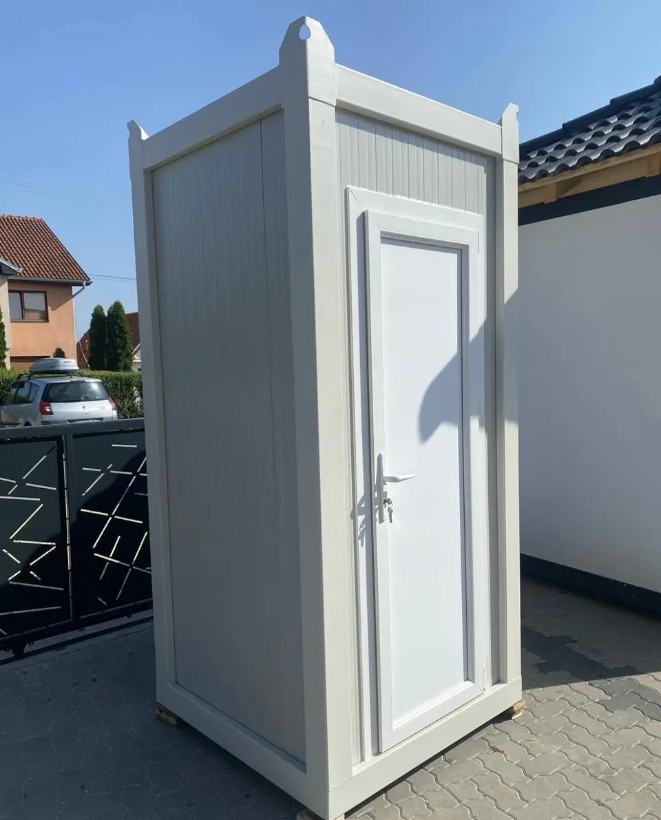 Side view of a white VIP cabin restroom